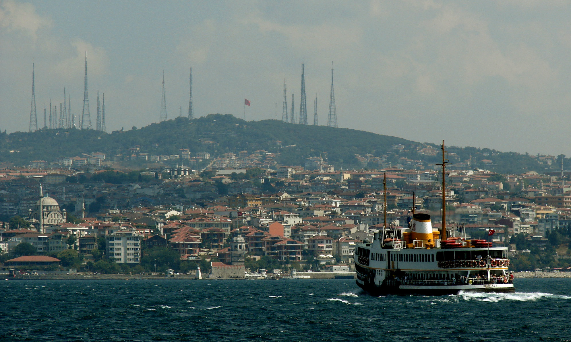 The Bosporus or Bosphorus, also known as the Istanbul Strait, is a strait that forms the boundary between the European part (Rumelia) of Turkey and its Asian part (Anatolia). The world's narrowest strait used for international navigation, it connects the Black Sea with the Sea of Marmara (which is connected by the Dardanelles to the Aegean Sea, and thereby to the Mediterranean Sea). It is approximately 30 km long, with a maximum width of 3,700 metres at the northern entrance, and a minimum width of 700 metres between Kandilli and Aşiyan; and 750 metres between Anadoluhisarı and Rumelihisarı. The depth varies from 36 to 124 metres in midstream. The shores of the strait are heavily populated as the city of Istanbul (with a metropolitan area in excess of 11 million inhabitants) straddles it. Flickr - Senol Demir.